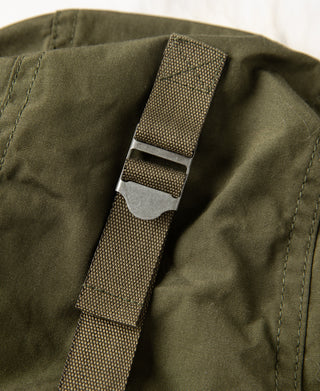 Olive parka adjustable hood strap with metal buckle and woven webbing