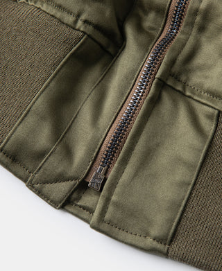 Olive flight jacket front zipper and snap placket with rib knit trim.