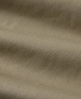 Khaki all-weather trench coat woven fabric close-up texture