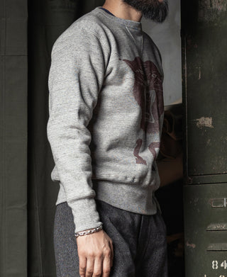 Gray long-sleeve sweater with panther graphic panel and ribbed cuffs