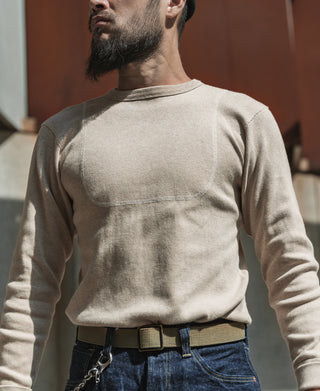 Apricot long-sleeve undershirt showing back yoke seam and crew neck