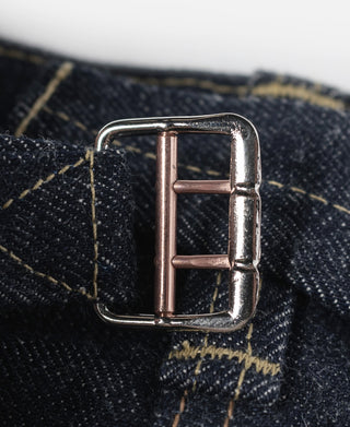Indigo denim jeans front buckle with copper center bar and silver frame
