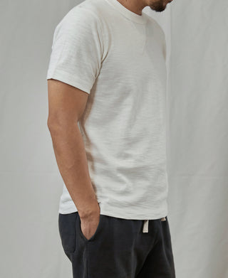 White crew-neck cotton t-shirt, short-sleeve style with relaxed fit