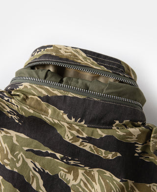 Camo tiger-stripe M-65 jacket with front zipper and olive lining at collar