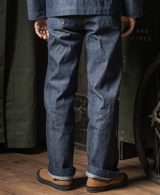 Indigo denim dungaree trousers with belt loops and cuffed hem