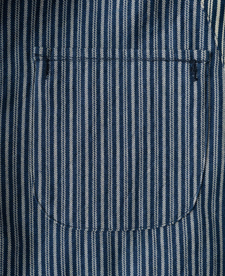 Striped cossack jacket front pocket area with visible flap and stitching