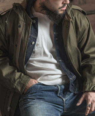 White long-sleeve henley shirt with button placket