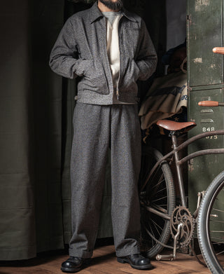 Salt-and-pepper cossack jacket worn with shirt and trousers, full body view
