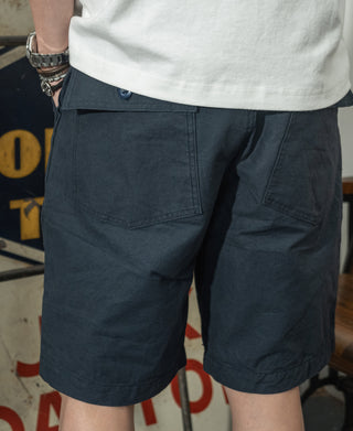Navy utility shorts with buttoned waistband and front slant pockets