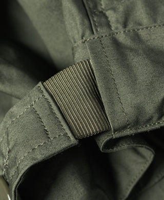 Olive M-65 parka adjustable cuff strap with ribbed elastic band