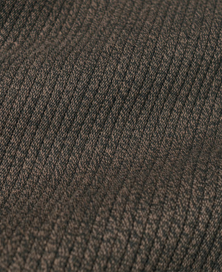 Pique salt-and-pepper stripe pants fabric close-up, brown mottled stripe texture