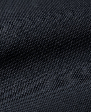 Navy canvas fabric close-up with tight woven texture