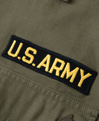 Olive vintage U.S. Army counselor shirt sleeve with embroidered U.S. ARMY patch