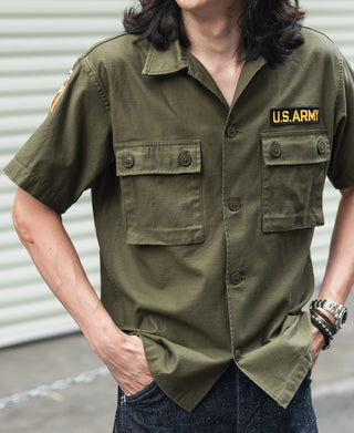 Olive short-sleeve button-up with chest pockets and U.S. ARMY patch