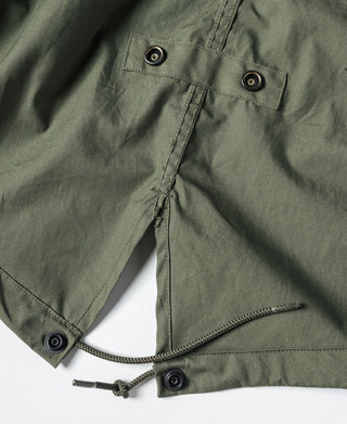 M-65 parka in olive with snap front, button cuffs, and drawstring hem