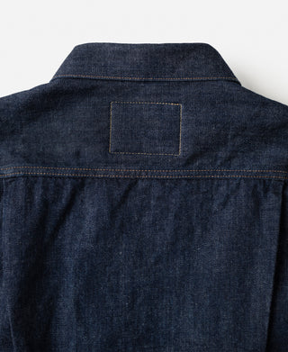 Indigo denim jacket, back yoke and rectangular patch at upper back