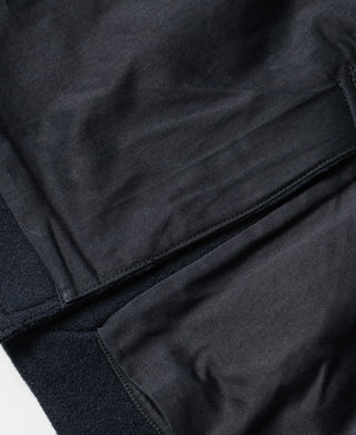 Navy peacoat hem seam with contrasting edge stitching