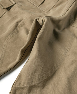 Khaki relaxed-fit pants with angled side seam and tapered leg opening