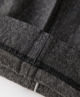 Salt and pepper trousers cuff hem with stitched edge and inner fold seam detail