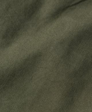 Olive fatigue pants fabric with fine woven texture
