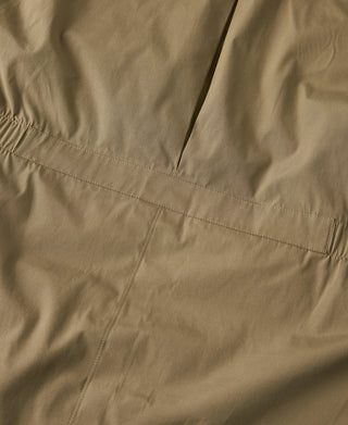 Khaki parka side seam with stitched panel lines