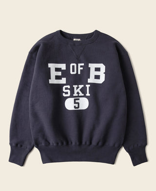 Navy crewneck V-inset ski sweater with white “E OF B SKI 5” graphic