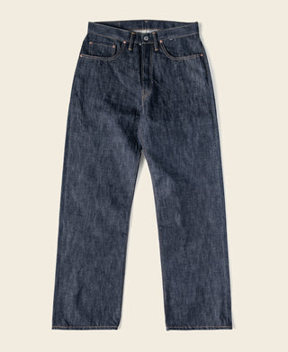 Indigo selvedge denim jeans with button fly, dark wash, and straight legs