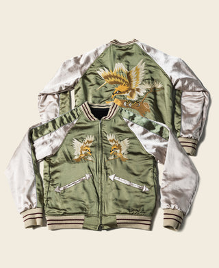 Reversible souvenir jacket with green body, white satin sleeves, and bird embroidery on the front