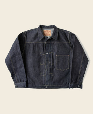 Indigo denim jacket on flat lay with button front and flap chest pockets