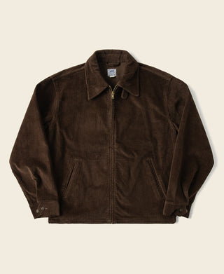 Brown 9 wale cotton corduroy zip-up jacket with buttoned cuffs and front zip.