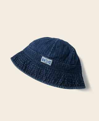 Indigo herringbone denim bucket hat with short brim and stitched crown