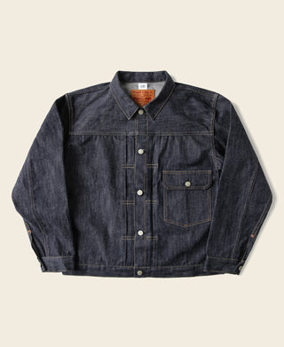 Indigo selvedge denim jacket with button front, point collar, and chest flap pockets