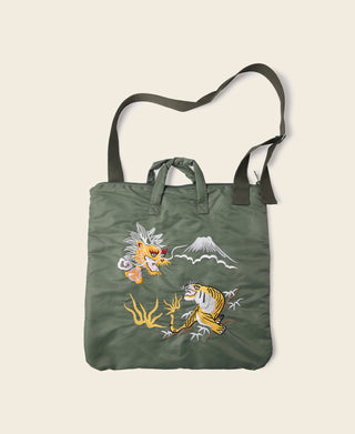 Olive canvas tote bag with embroidered tiger-and-dragon scene and top carry handles
