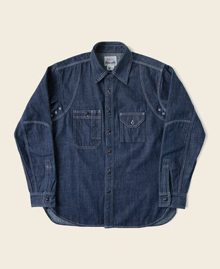 Indigo denim work shirt with two chest pockets and button front placket