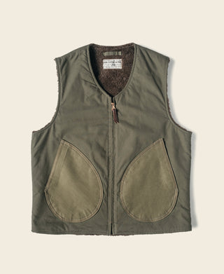 Olive pile-lined zip-front vest with two large rounded side pockets