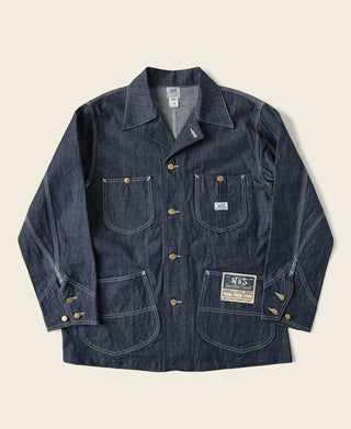 Indigo denim jacket with buttoned flap chest pockets and contrast-stitched detailing
