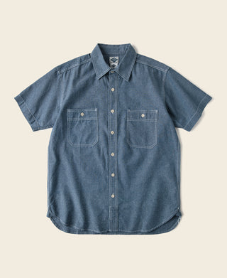 Blue chambray work shirt, short sleeves, button front, pointed collar, chest pockets