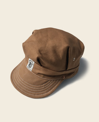 Ginger duck canvas railroad engineer cap with curved brim and stitched panel detail