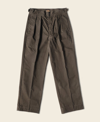 Dark brown combat pants with pleated front, belt loops, and cuffed straight legs