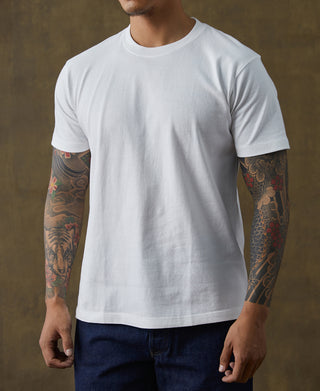 White cotton tubular T-shirt front view on model, crew neckline