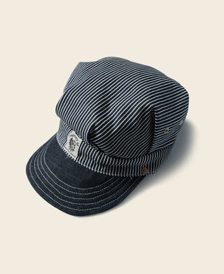 Hickory stripe railroad engineer cap with dark denim brim and side patch