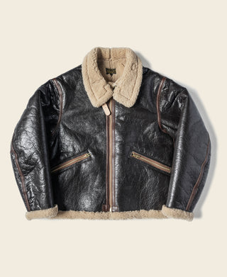 Dark brown leather flight jacket with shearling collar and zip-front, two chest pockets