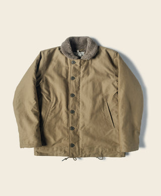 Khaki N-1 deck jacket with dark gray shearling collar and front button placket