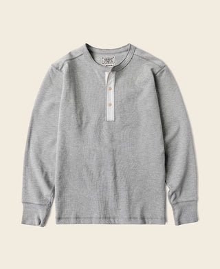Gray long-sleeve henley shirt with buttoned placket and ribbed cuffs, front view