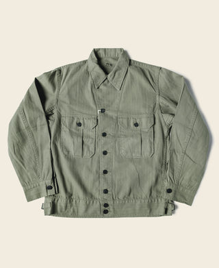 Olive fatigue jacket with front button closure and two chest flap pockets