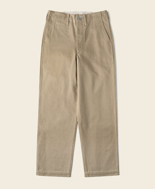 Tan chino trousers laid flat, front waistband with button closure
