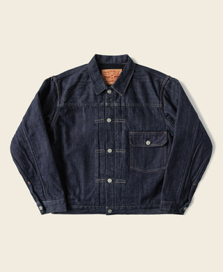Indigo denim jacket with front buttons and chest pockets, blanket-lined collar