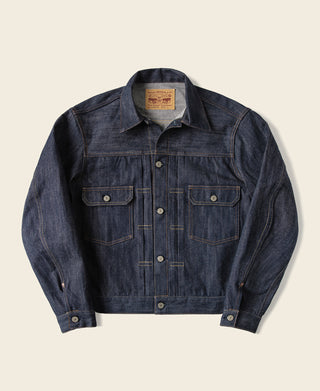 Indigo denim jacket with button front and chest flap pockets, long sleeves