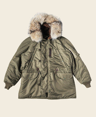 Olive Type N-3 parka with button front, flap pockets, and fur-trimmed hood