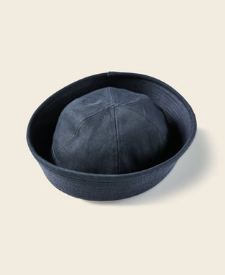 Navy Dixie Cup military hat with interior lining visible from above